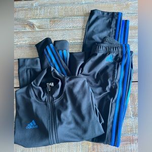 Adidas TrackSuit black with blue stripes size  XS.
